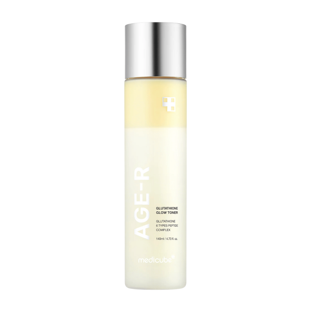 Fles van Medicube Age-R Glutathione Glow Toner, een lichtgele toner met glutathion en een peptidecomplex. Het product is ontworpen om de huid langdurige glans en een egale teint te geven. De fles heeft een elegant, minimalistisch ontwerp met een zilverkleurige dop.