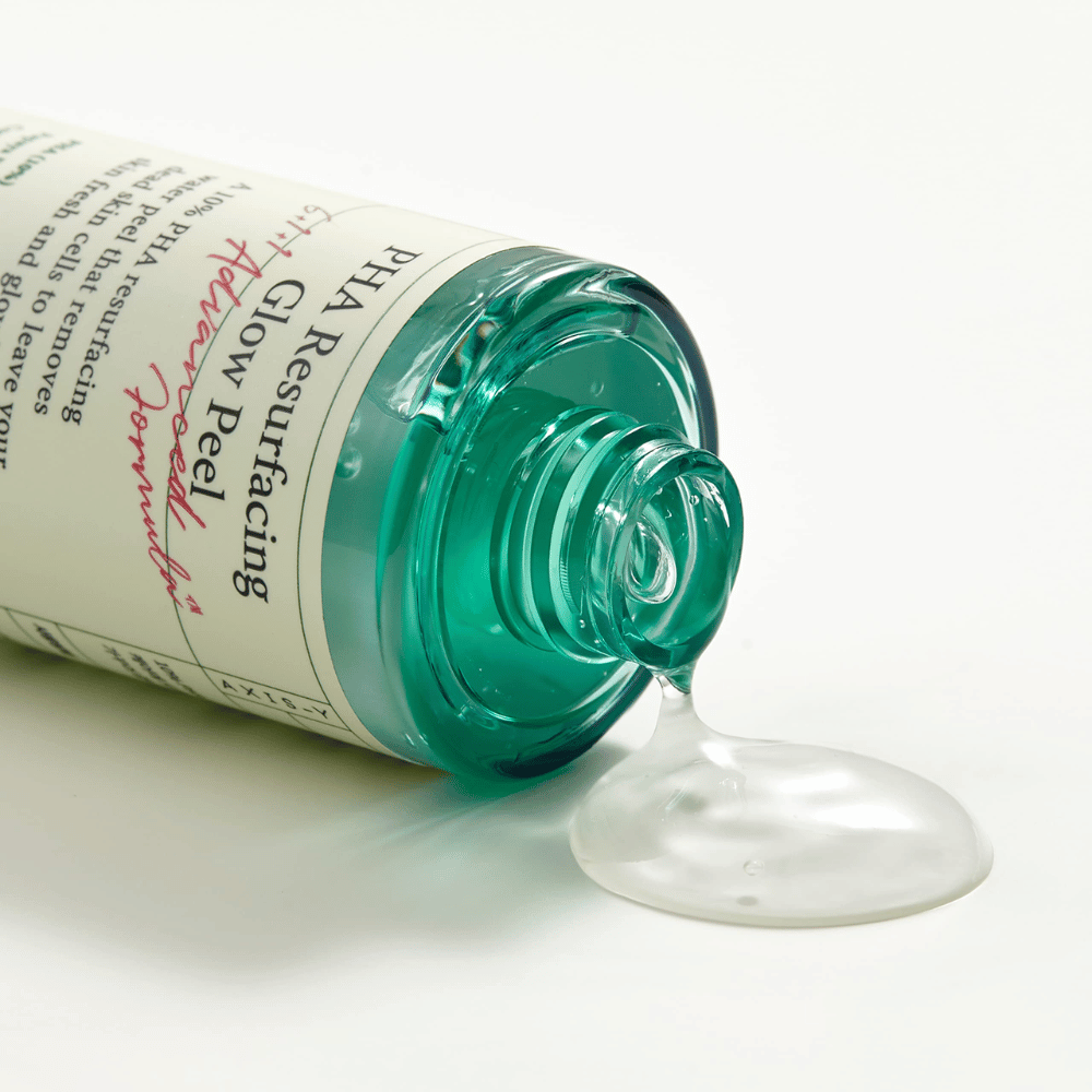 Een fles AXIS - Y PHA Resurfacing Glow Peel 50ml op een glad oppervlak.