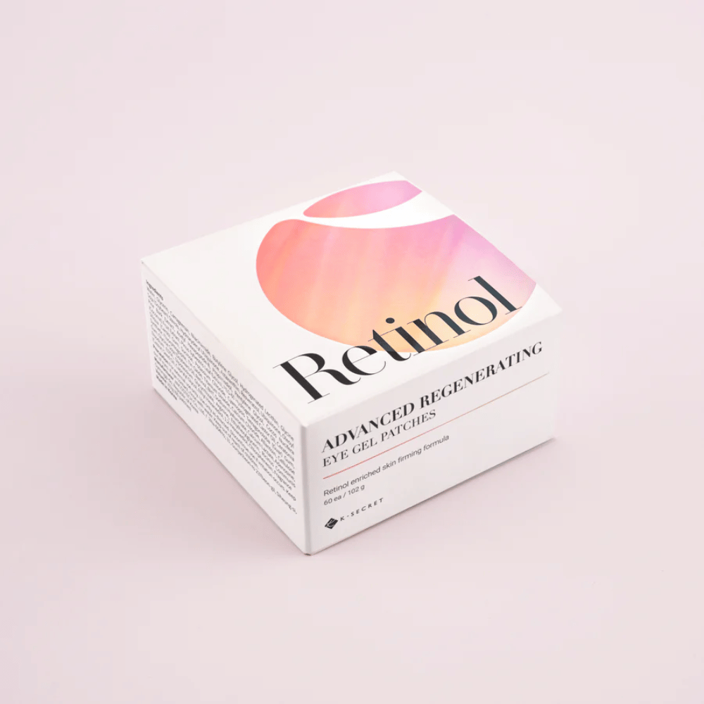Verpakking van K-Secret Advanced Regenerating Eye Gel Patches met retinol in wit en roze design.