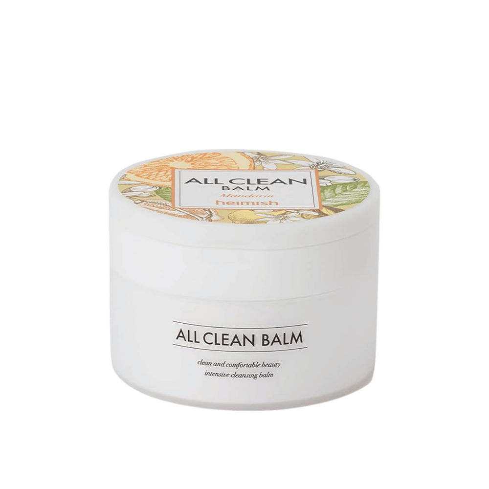 Een pot van Heimish All Clean Balm met mandarijnengeur, een intensieve reinigingsbalsem, met een kleurrijk etiket en een witte verpakking.