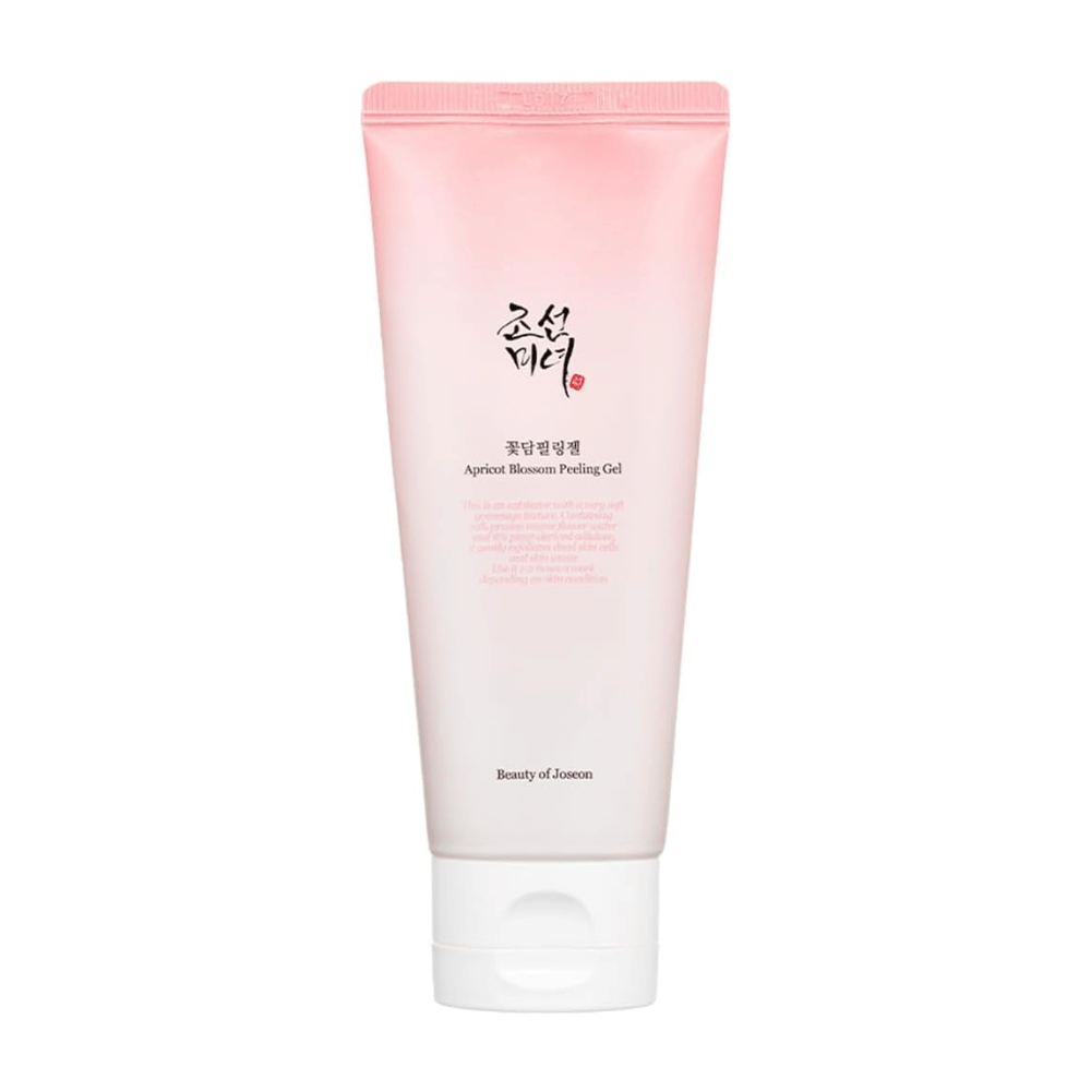 Een roze tube met Apricot Blossom Peeling Gel van Beauty of Joseon op een witte achtergrond.