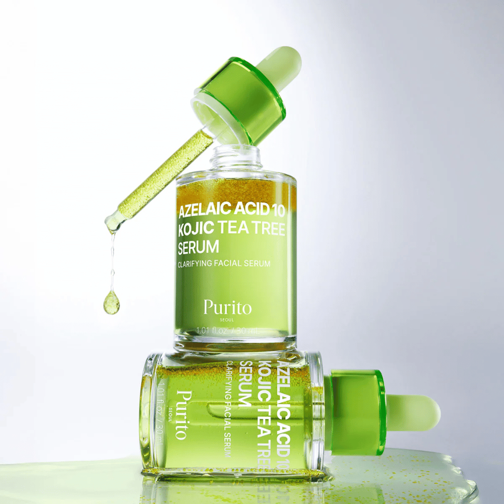 Purito Azelaic Acid 10 Kojic Tea Tree Serum – frisse groene formule met druppel uit pipet die de lichte textuur van het serum laat zien.