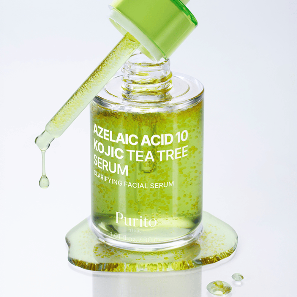 Close-up van Purito Azelaic Acid 10 Kojic Tea Tree Serum met pipet en druppels. Geeft een helderdere huid en vermindert onzuiverheden.