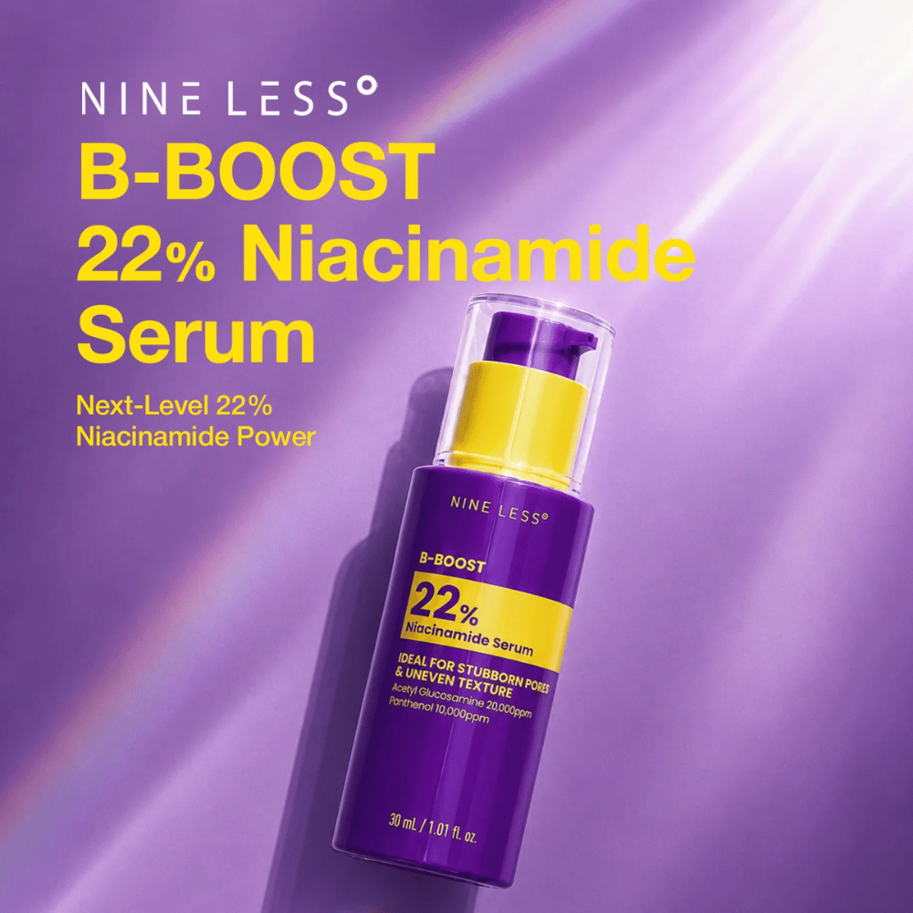 6. NINE LESS B-Boost 22% Niacinamide Serum – paarse serumflacon met geel etiket tegen zichtbare poriën