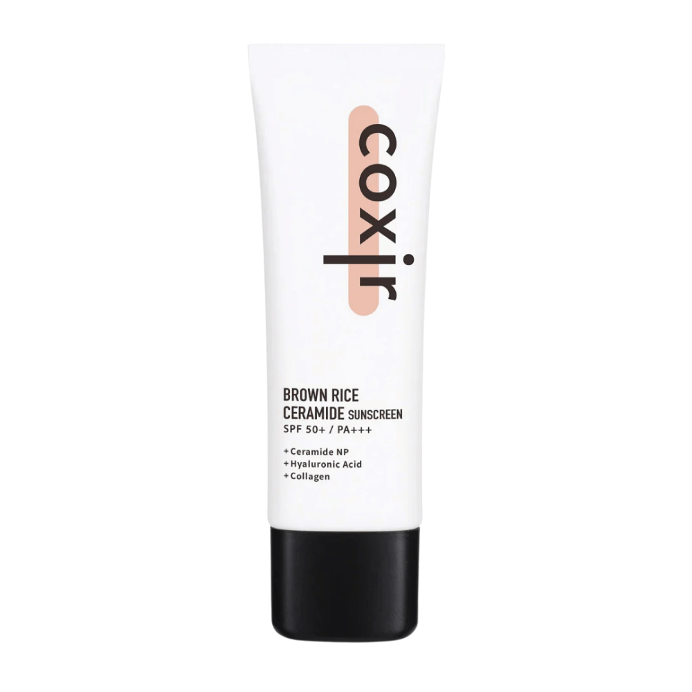 Productafbeelding van Coxir Brown Rice Ceramide Sunscreen in een witte tube met een zwarte dop, SPF 50+ PA+++, bevat ceramiden, hyaluronzuur en collageen.