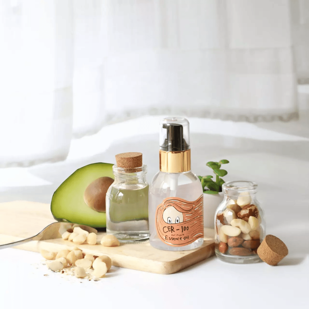 Elizavecca CER-100 Hair Muscle Essence Oil – Koreaanse haarolie met avocado en natuurlijke oliën die helpt te hydrateren, te versterken en glans te geven aan droog en beschadigd haar.