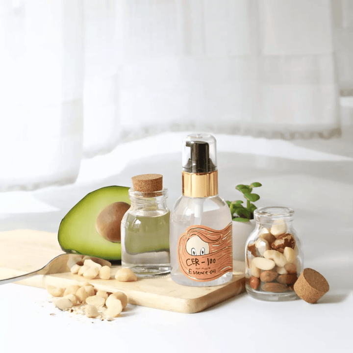 Elizavecca CER-100 Hair Muscle Essence Oil – Koreaanse haarolie met avocado en natuurlijke oliën die helpt te hydrateren, te versterken en glans te geven aan droog en beschadigd haar.