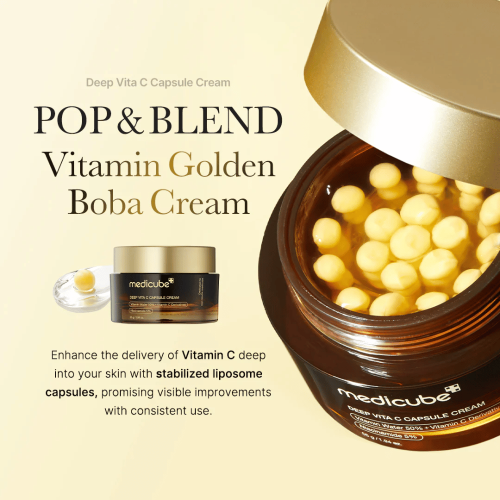 De verpakking van "Medicube Deep Vita C Capsule Cream", een met vitamine C verrijkte crème die gestabiliseerde liposoomcapsules bevat om de huid effectief te penetreren. De tekst "POP & BLEND Vitamin Golden Boba Cream" benadrukt de eigenschappen van het product, en de visuele presentatie toont de capsules die zichtbare verbeteringen beloven bij continu gebruik.