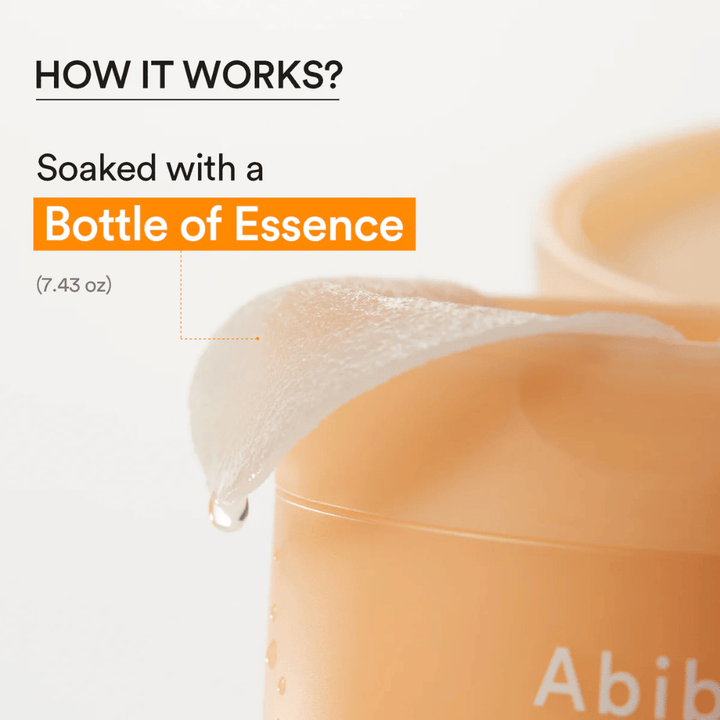 Close-up van een hydraterende tonerpad doordrenkt met essence van Abib Glutathiosome Dark Spot Pad Vita Touch.