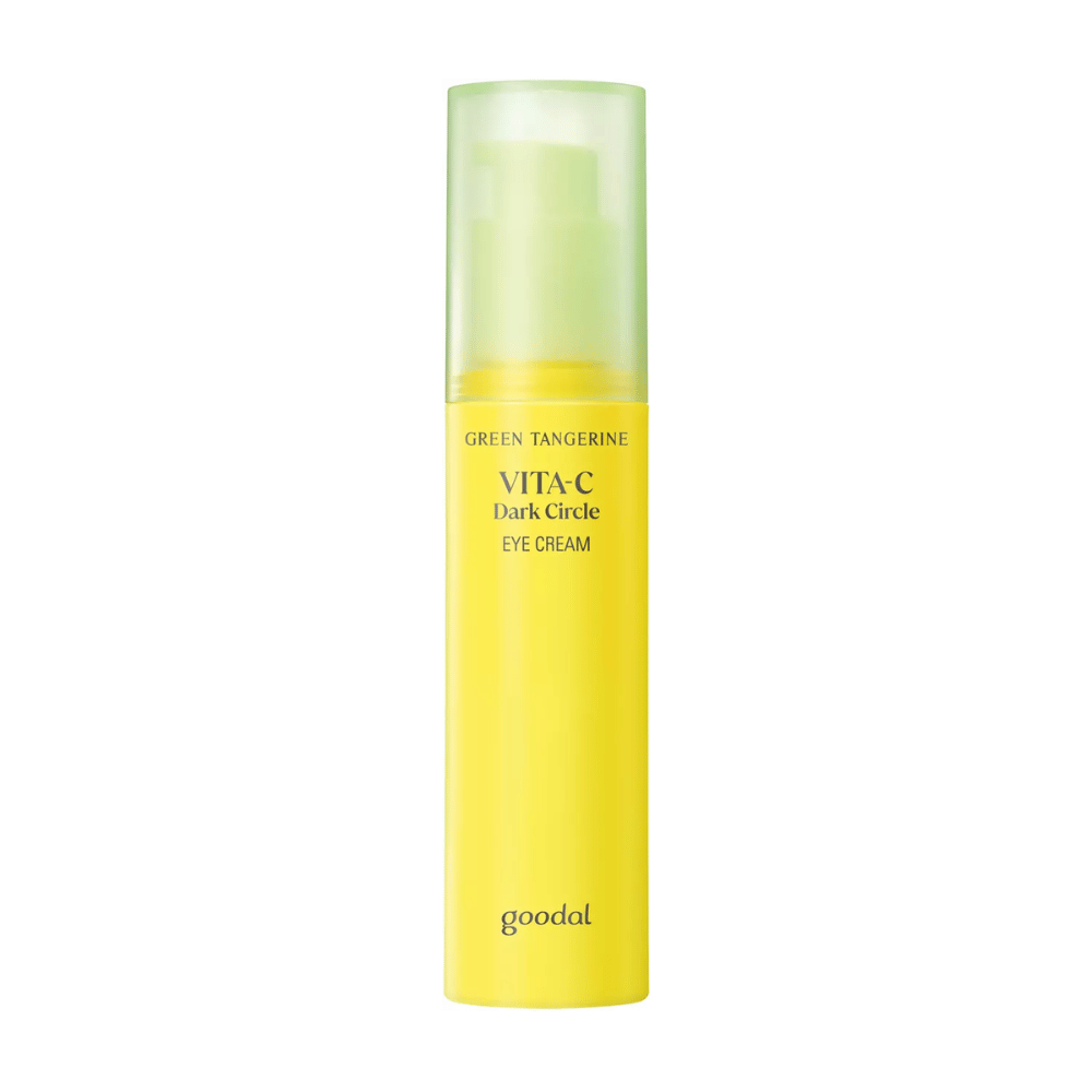 Een fles Goodal Green Tangerine Vita C Dark Circle Eye Cream 30ml op witte achtergrond met vitamine C.