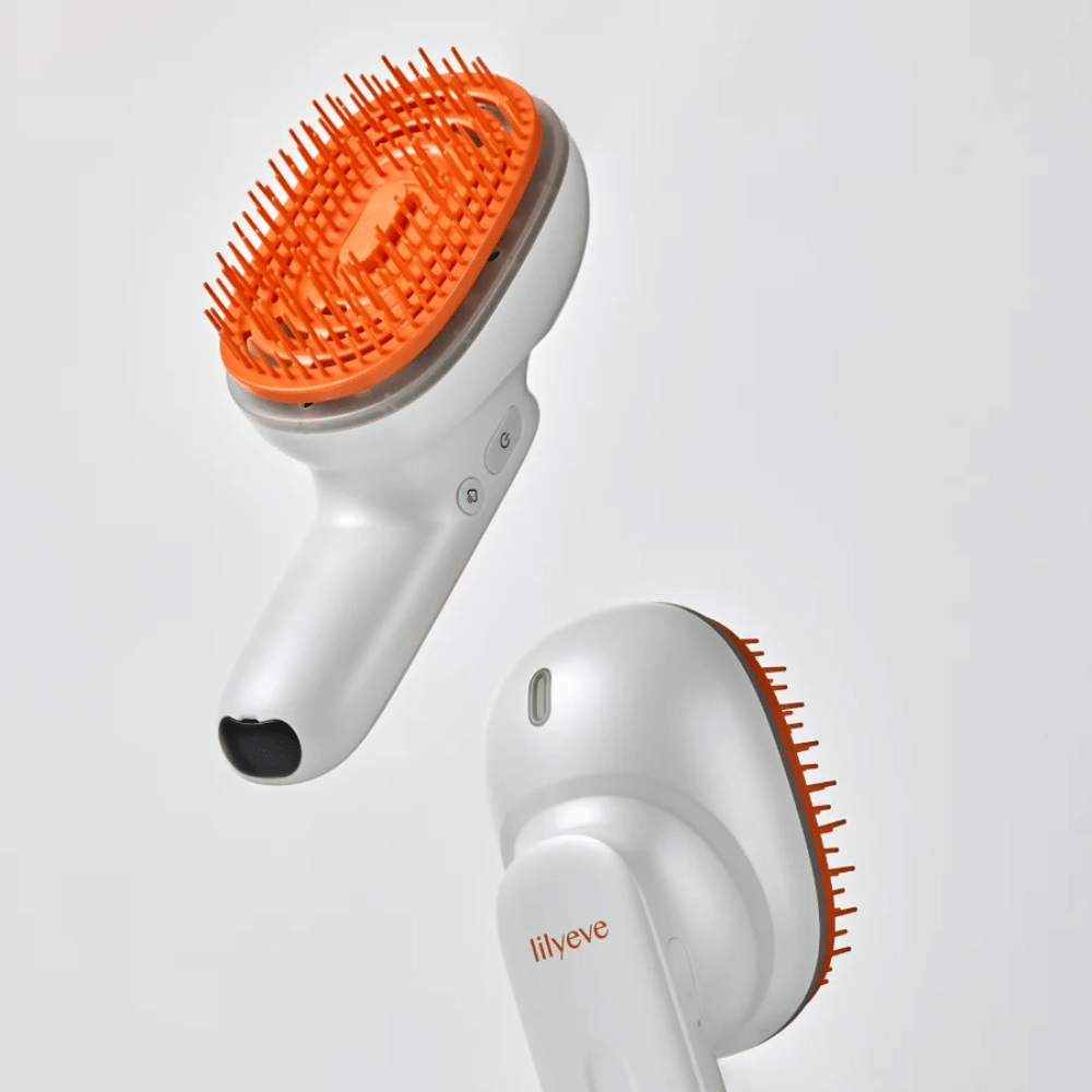 LILYEVE GrowTurn Brush Steam Booster – voor- en achterkant met ergonomisch handvat en oranje borstelharen