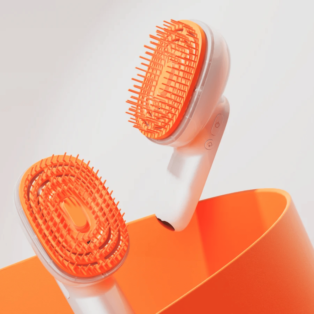 LILYEVE GrowTurn Brush Steam Booster – elektrische hoofdhuidborstel met oranje borstelkop