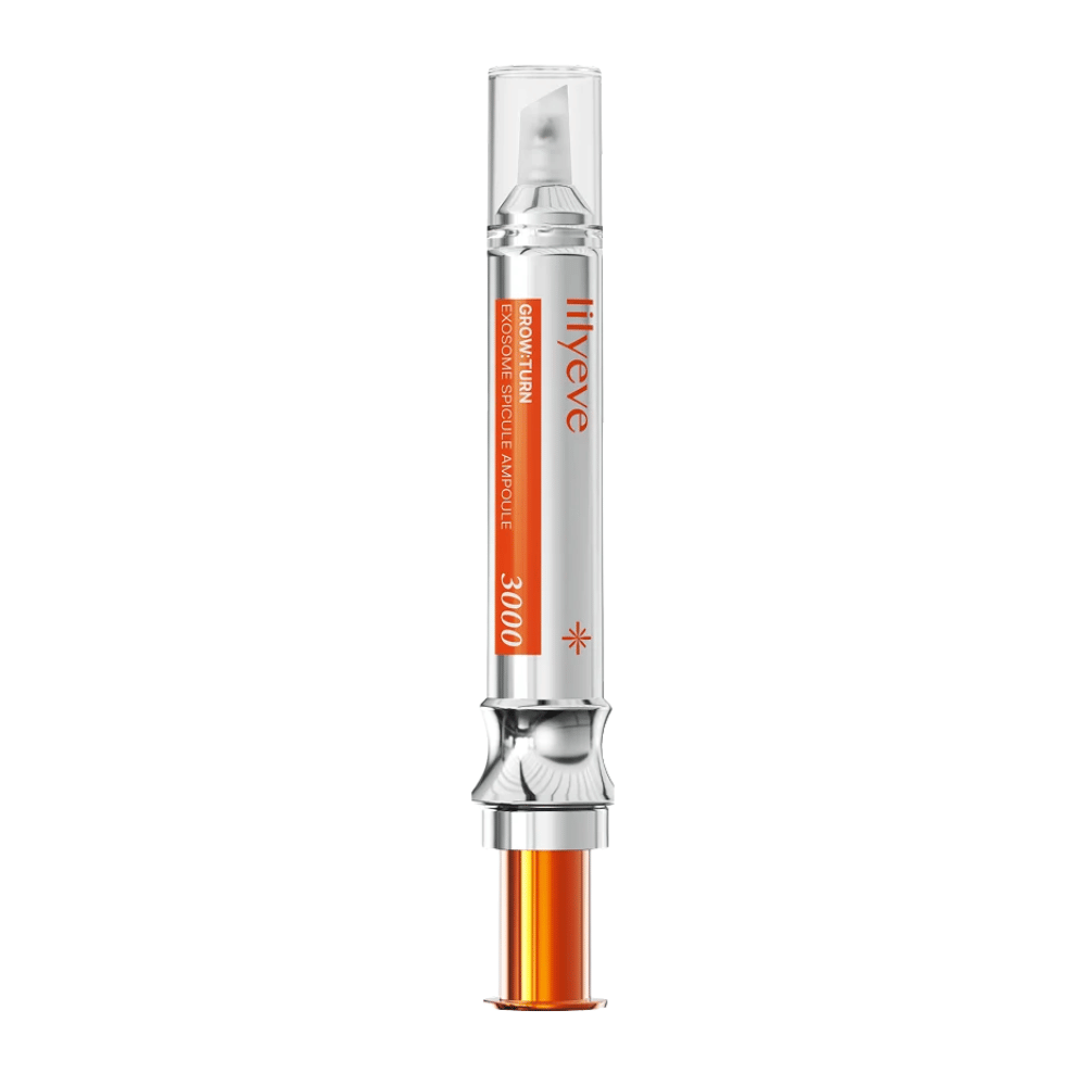 LILYEVE Grow Turn Exosome Spicule Ampoule 3000 – hoofdhuidampul met precisieapplicator in zilver- en oranjekleurige verpakking.