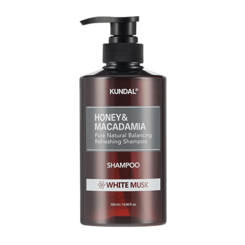 KUNDAL Honey & Macadamia Nature Shampoo White Musk in een bruine plastic fles met pomp, 500 ml.
