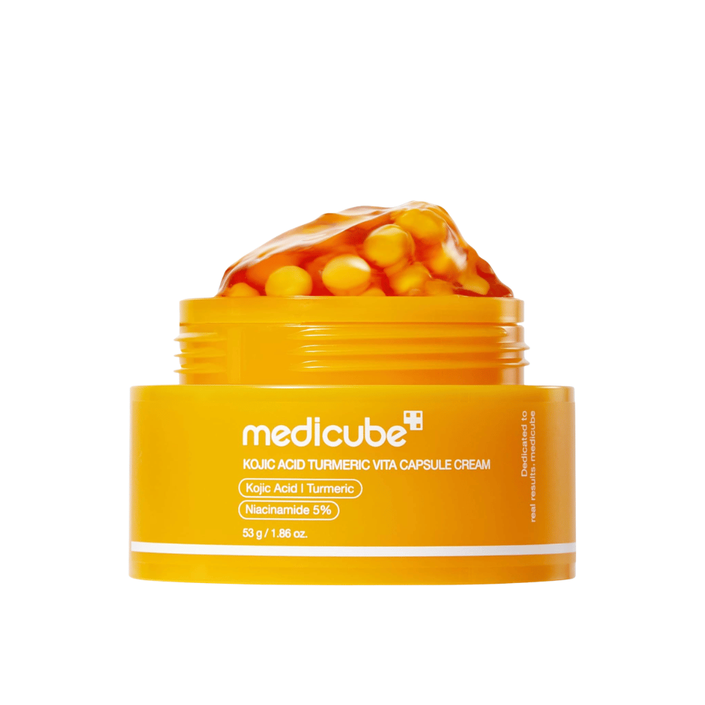 5. Medicube Kojic Acid Turmeric Vita Capsule Cream 53 g – gelecrèmepot met capsules op witte achtergrond
