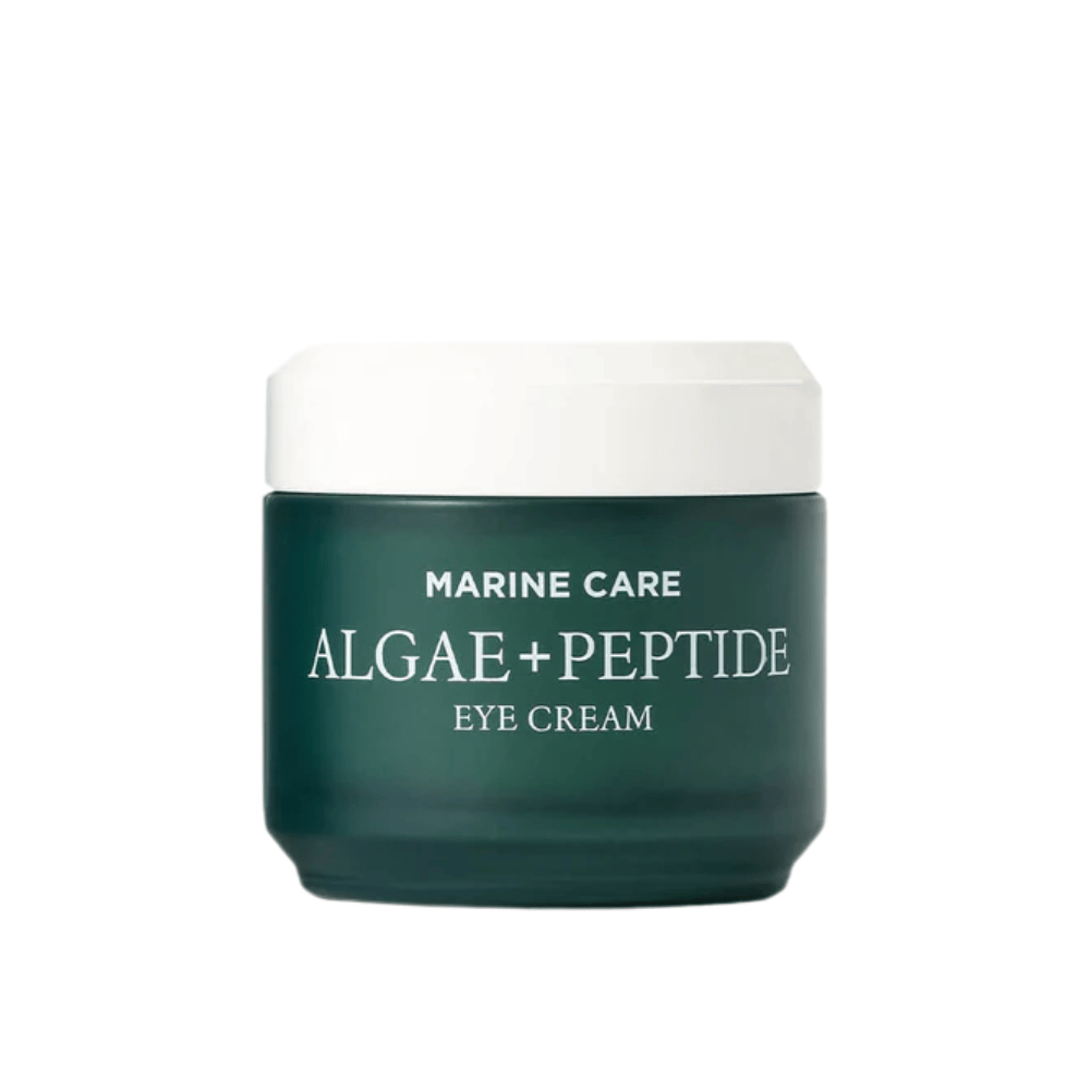 Heimish Marine Care Algae + Peptide Eye Cream in een donkergroene pot met een witte deksel. Een oogcrème verrijkt met algen en peptiden om te hydrateren, op te lichten en fijne lijntjes rond de ogen te verminderen.