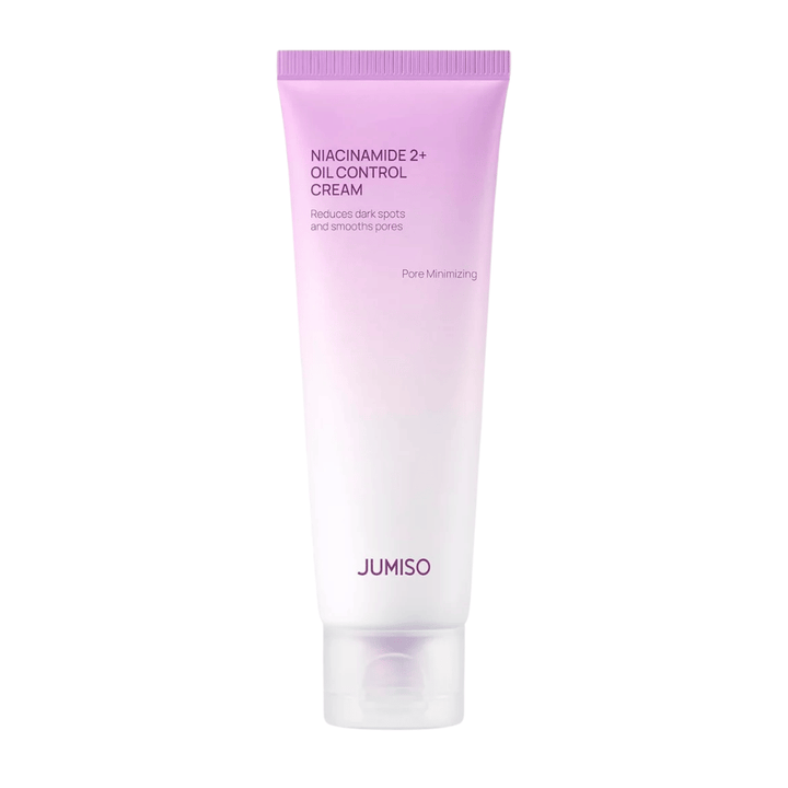Productafbeelding van JUMISO Niacinamide 2+ Oil Control Cream op een lichte achtergrond. De roze en witte tube benadrukt de focus van het product op talgcontrole, porieverfijning en een verbeterde huidtoon voor de vette en gecombineerde huid.
