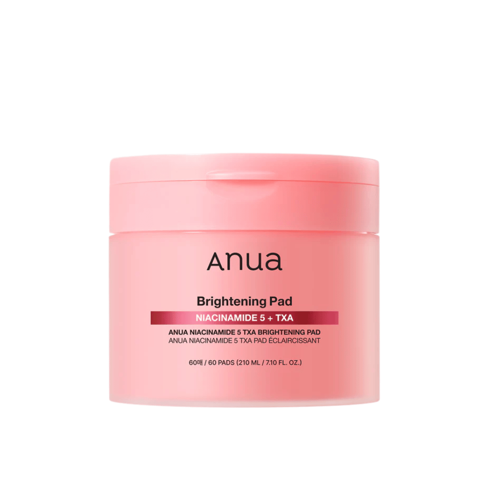 Roze verpakking van Anua Brightening Pad met de tekst "Niacinamide 5 + TXA", bevat 60 pads voor huidverzorging met focus op glans en een egalere huidtint.