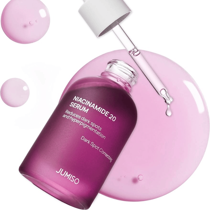 Närbild på Jumiso Niacinamide 20 Serum – ljusrosa textur som effektivt ljusar upp hudton och minskar hyperpigmentering.