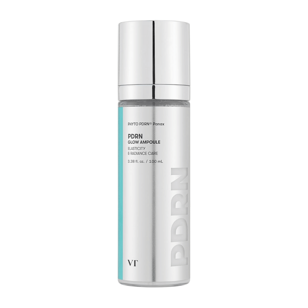 VT PDRN Glow Ampoule in een zilverkleurige fles met pomp, met etiketter die de inhoud van 100 ml aangeven. Het product is ontworpen voor elasticiteit en stralende huid, met de tekst "PHYTO PDRN® Panax" en "Elasticity & Radiance Care".