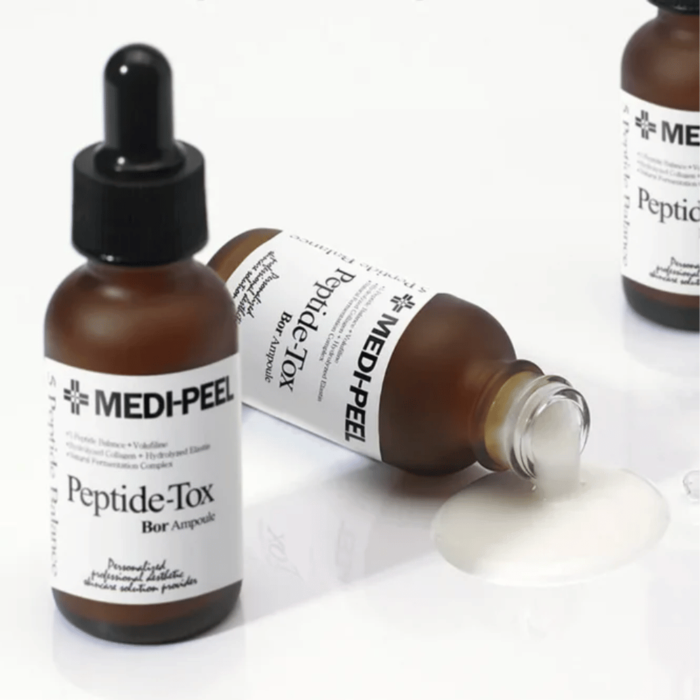MEDI-PEEL Peptide-Tox Bor Ampoule met zichtbare serumtextuur – anti-aging serum met peptidecomplex dat verhoogde elasticiteit, vollere huid en een gelijkmatigere huidstructuur biedt.