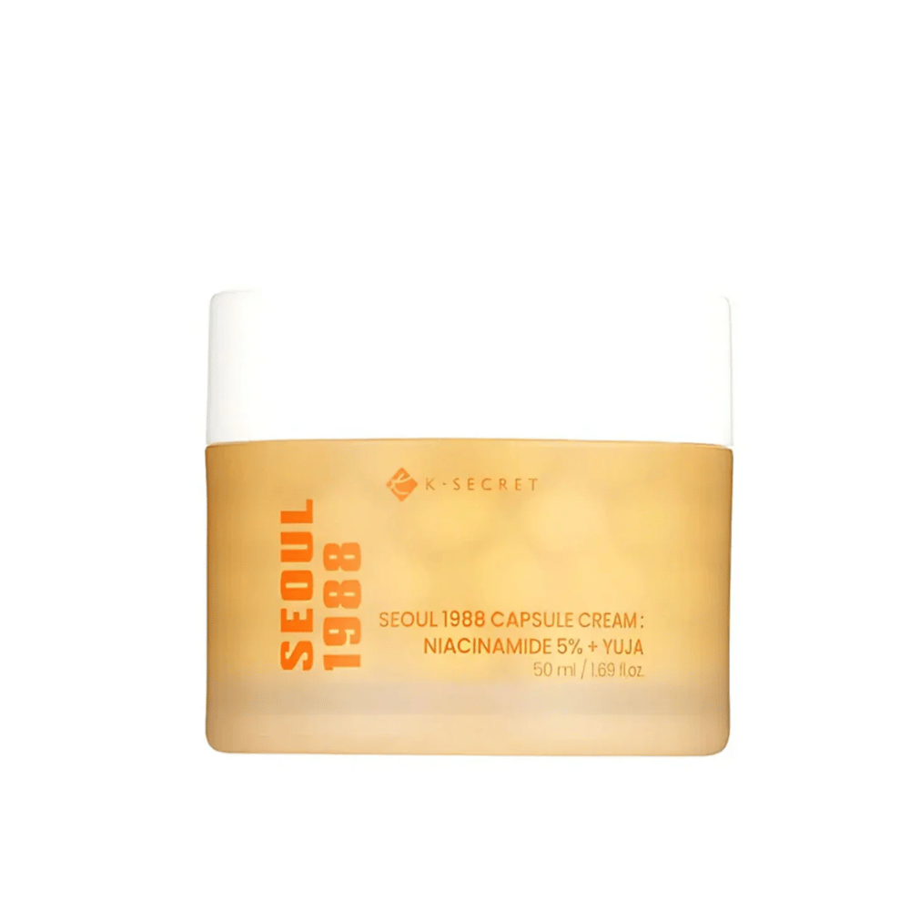 Pot met K-Secret Seoul 1988 Capsule Cream Niacinamide 5% + Yuja, 50 ml, in goudkleurig ontworpen verpakking.