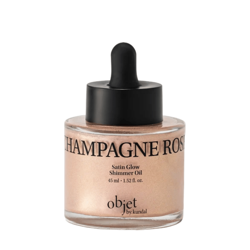 Objet by KUNDAL Satin Glow Shimmer Oil Champagne Rose 45 ml – glansgevende lichaamsolie met een fijne roségoud glinsterende finish.