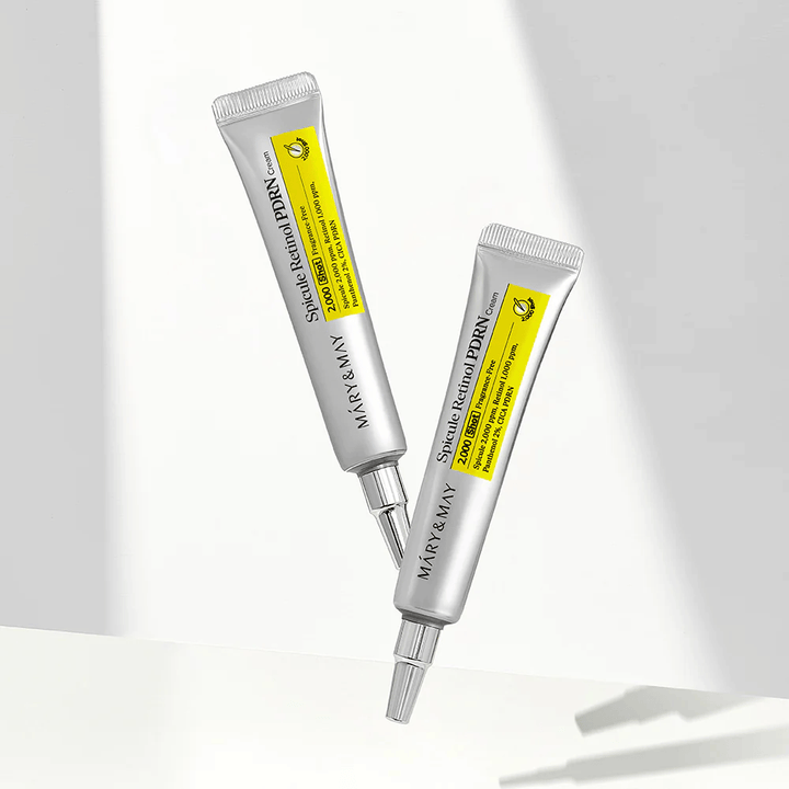 Twee tubes van MARY & MAY Spicule Retinol PDRN Cream op lichte achtergrond, een intensieve nachtcrème met spicule en retinol voor huidvernieuwing en verbeterde huidtextuur.