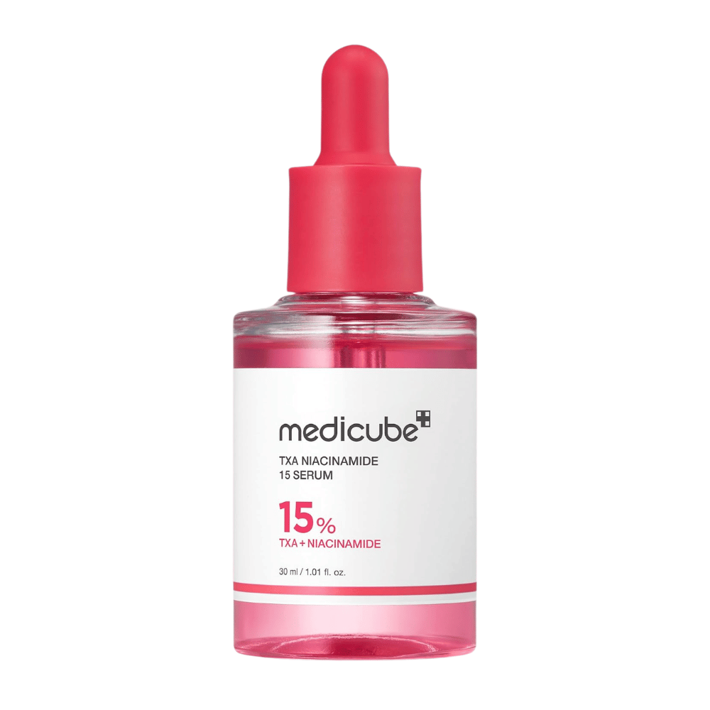 4. Medicube TXA Niacinamide 15 Serum 30 ml – roze serumfles met pipet tegen een witte achtergrond