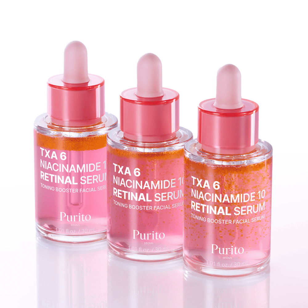 Drie flessen van Purito TXA 6 Niacinamide 10 Retinal Serum. Een glansgevende en egaliserende gezichtsserum met anti-aging effect.