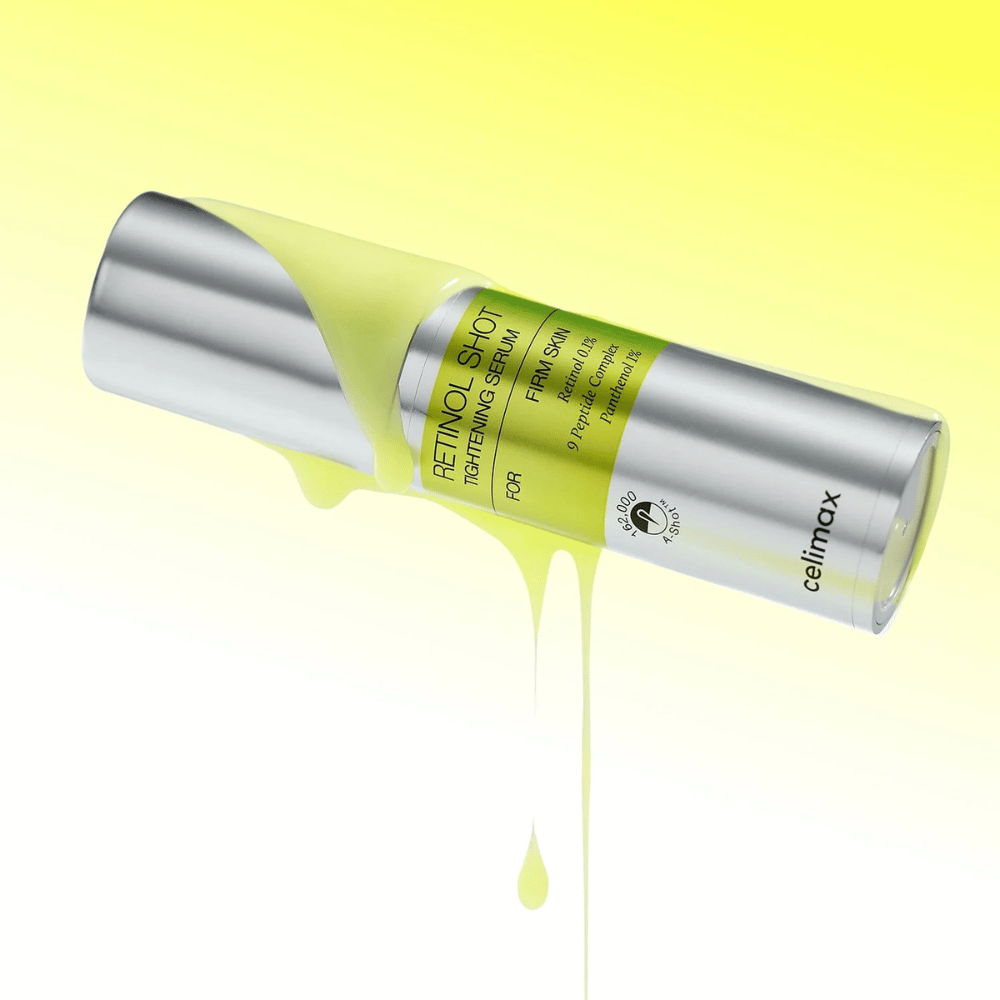 Productafbeelding van The Vita-A Retinol Shot Tightening Serum van Celimax met geel serum dat langs de fles loopt tegen een lichtgele achtergrond.