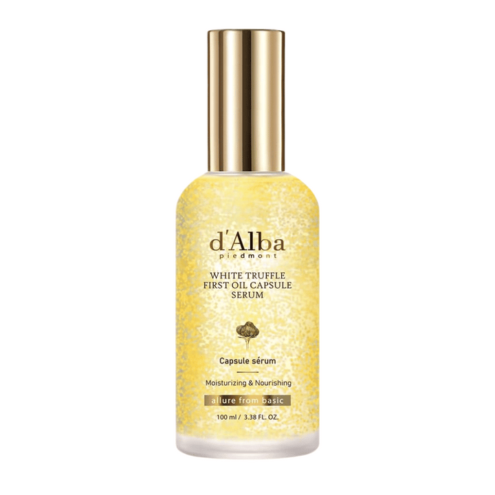 Produktbild av d'Alba White Truffle First Oil Capsule Serum i genomskinlig flaska med guldfärgade kapslar.