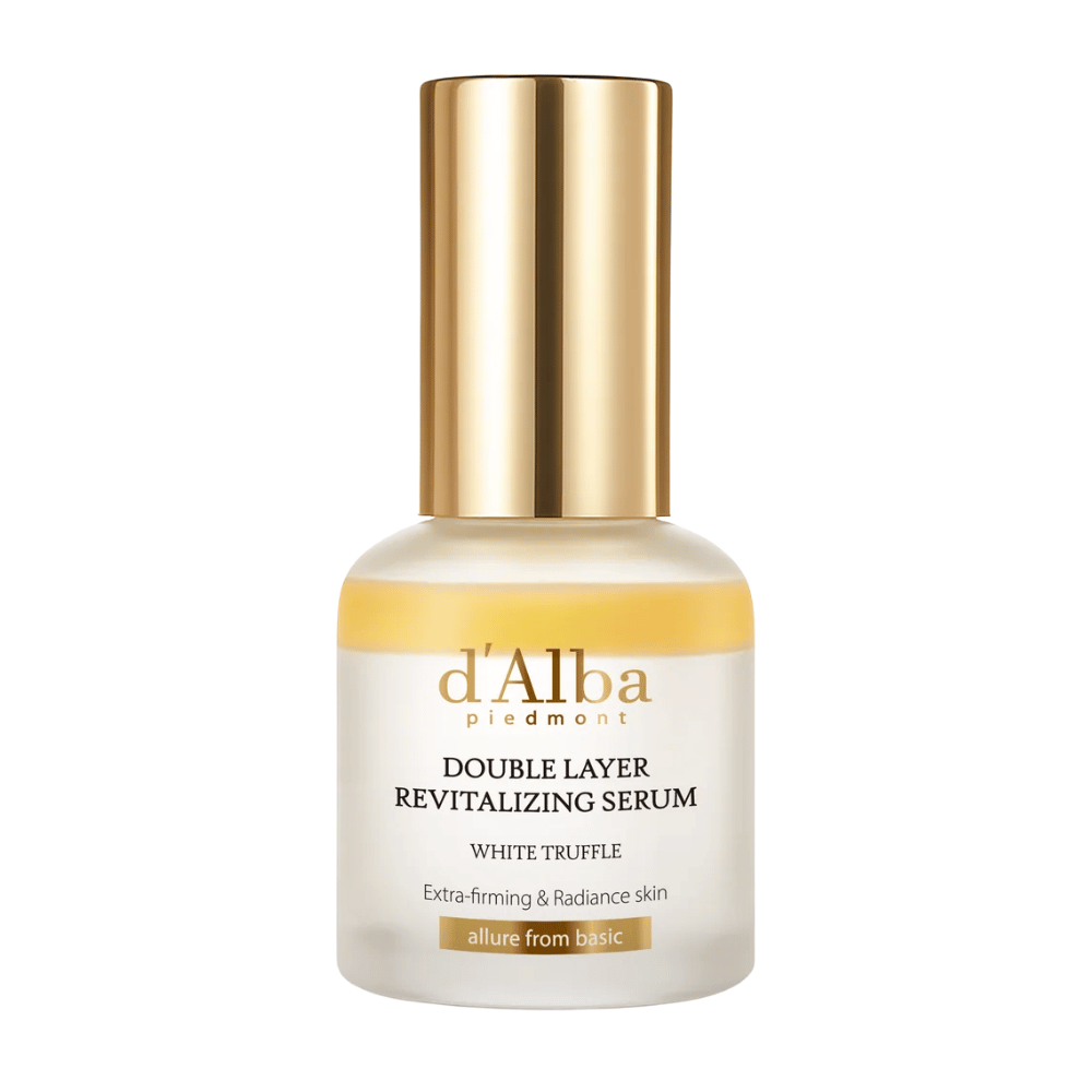 d'Alba Double Layer Revitalizing Serum White Truffle in een elegante glazen fles met goudkleurige dop, ontworpen voor extra stevigheid en glans van de huid.