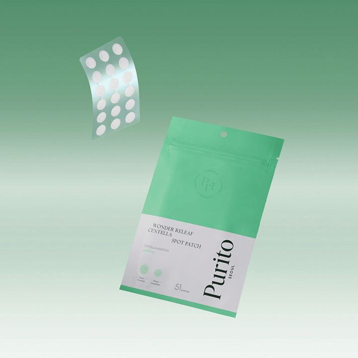 Purito Wonder Releaf Centella Spot Patch met verpakking en transparante acnepleisters, kalmerende puntbehandeling met centella asiatica voor puistjes en geïrriteerde huid.