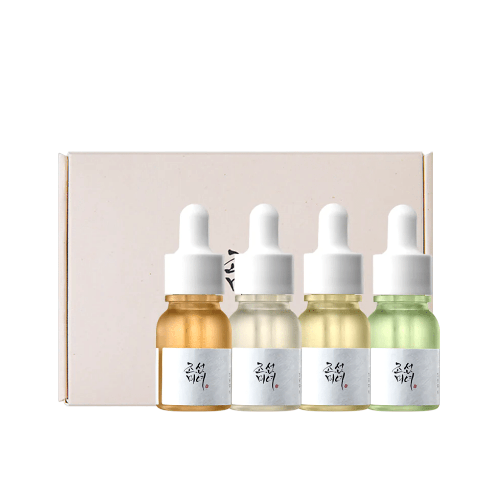 Een doos met drie flessen Hanbang Serum Discovery Kit 4 st van Beauty of Joseon, die elk een jeugdige gloed bevorderen en rimpels verminderen.