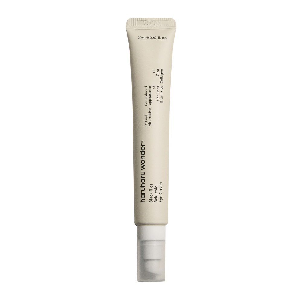 Een tube Haruharu Wonder Black Rice Bakuchiol Eye Cream 20ml op witte achtergrond om de zichtbaarheid van fijne lijntjes en rimpels te verminderen.