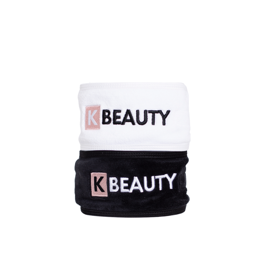 Twee zwart-witte K-Beauty Make-up Haarbanden met het woord schoonheid.